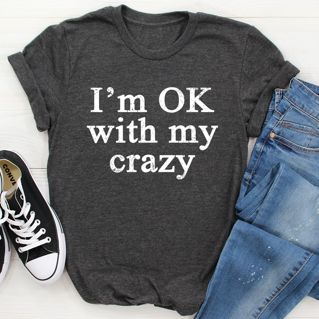 I'm OK With My Crazy T-Shirt displayed on a mannequin, showcasing its soft cotton fabric and vibrant print.