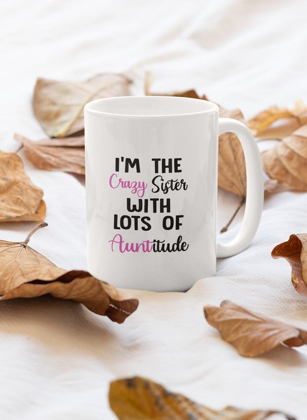 A stylish 11oz ceramic mug with the text 'I'm The Crazy Sister' printed on it, featuring a glossy finish and sturdy handle.