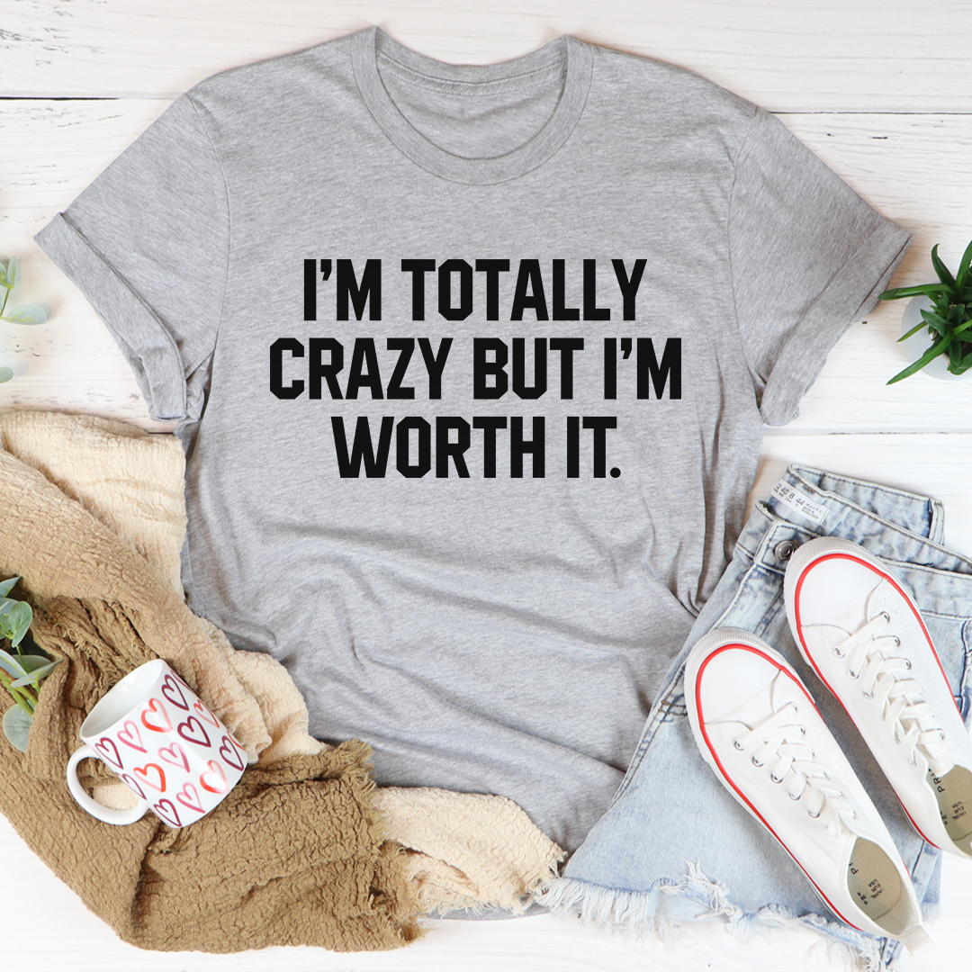 I'm Totally Crazy But I'm Worth It T-Shirt displayed on a mannequin, showcasing its soft cotton fabric and unique design.