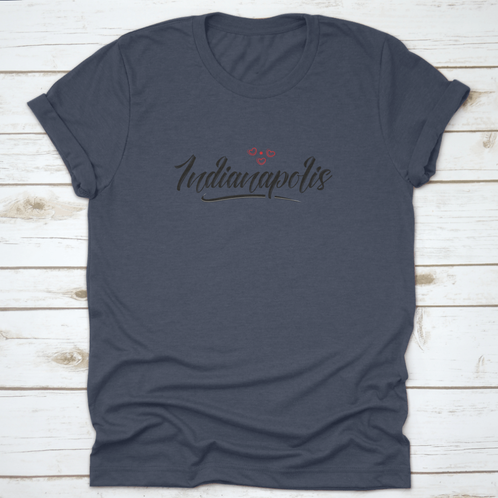 A stylish cotton t-shirt featuring a typographic design of Indianapolis with a red heart icon, showcasing love for the city.