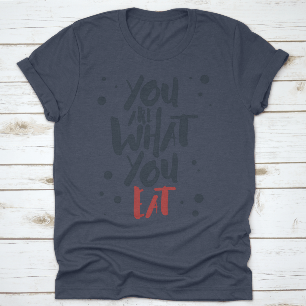 Inspirational T-shirt featuring red and black vector lettering on a white background, made from 100% cotton.