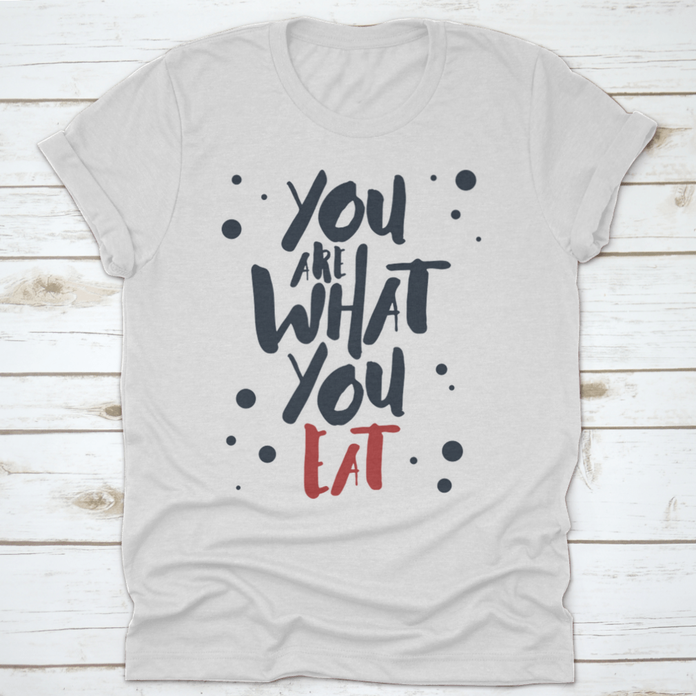 Inspirational T-shirt featuring red and black vector lettering on a white background, made from 100% cotton.