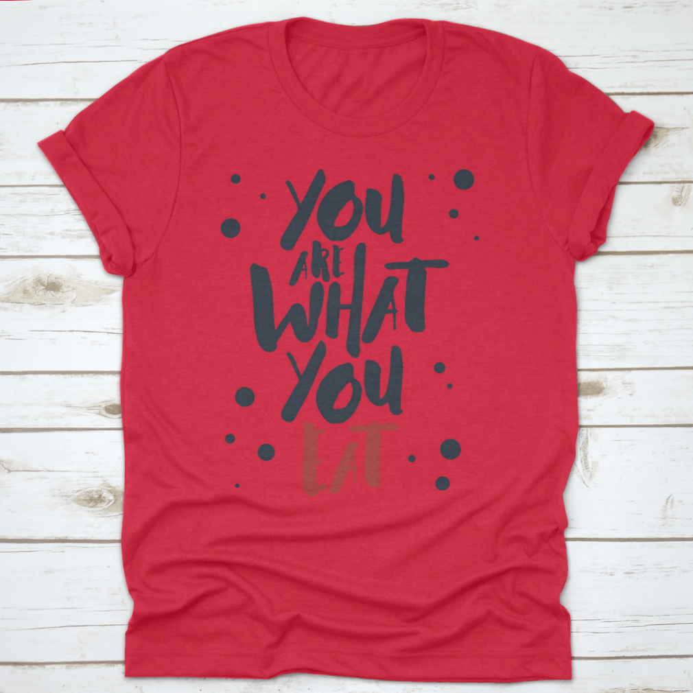 Inspirational T-shirt featuring red and black vector lettering on a white background, made from 100% cotton.