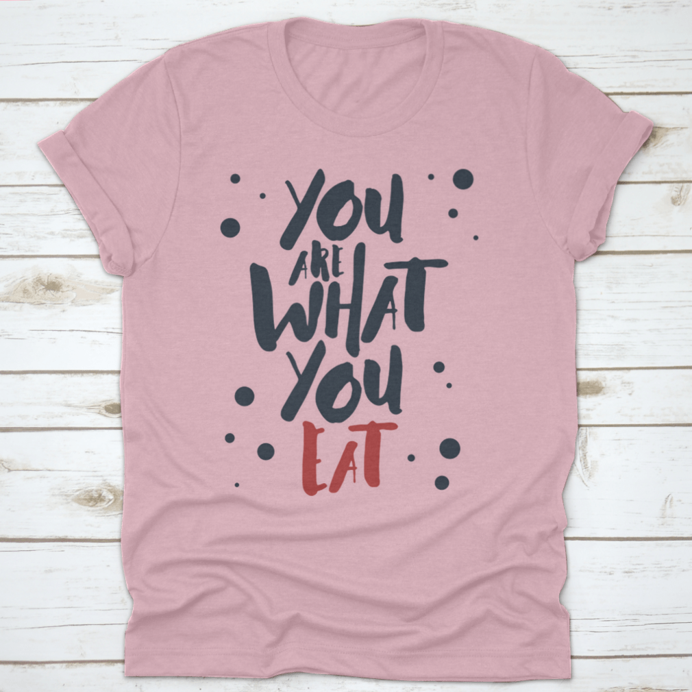 Inspirational T-shirt featuring red and black vector lettering on a white background, made from 100% cotton.