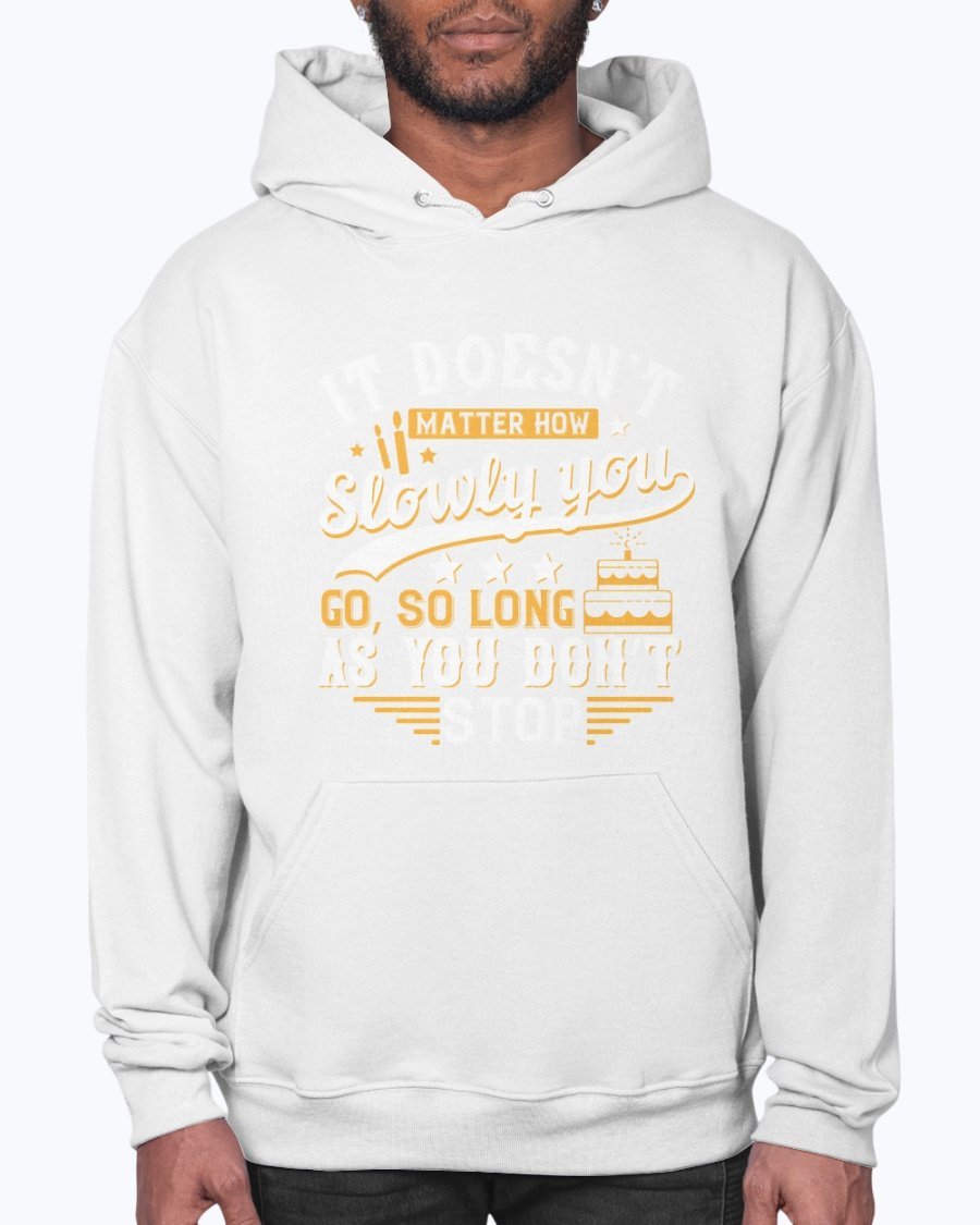 A cozy unisex hoodie featuring the motivational quote 'It doesn’t matter how slowly you go, so long as you don’t stop' in stylish font.