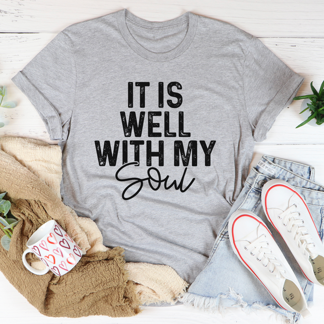 It Is Well With My Soul T-Shirt displayed on a mannequin, showcasing its soft cotton fabric and double-stitched neckline.