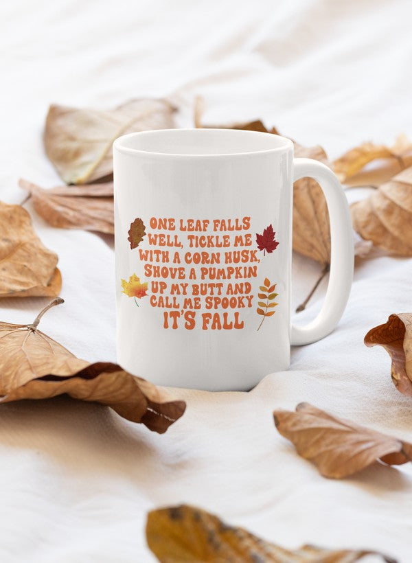 A stylish 11oz ceramic mug with a glossy finish, featuring a sturdy handle, perfect for fall beverages.