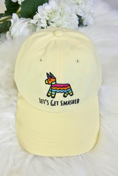 Embroidered bachelorette hats in white and soft pink with fun phrases for a fiesta theme.