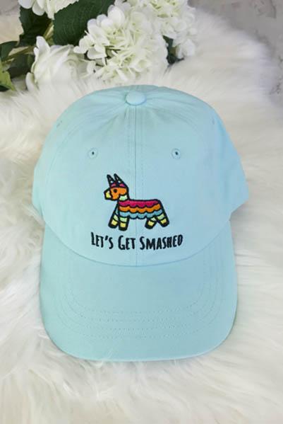 Embroidered bachelorette hats in white and soft pink with fun phrases for a fiesta theme.