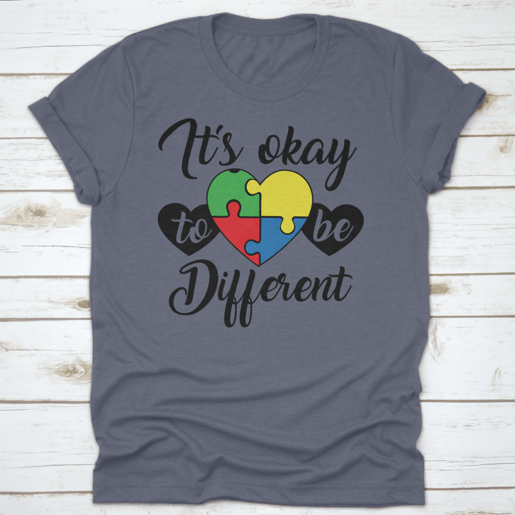 A soft, comfortable T-shirt featuring the phrase 'It's Okay To Be Different' in a stylish design, perfect for casual wear.