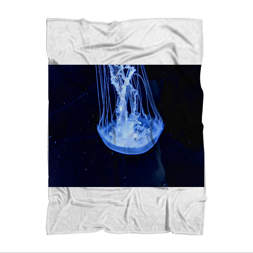 JellyFish Sublimation Throw Blanket featuring vibrant jellyfish print on soft polar fleece fabric, ideal for cozying up.