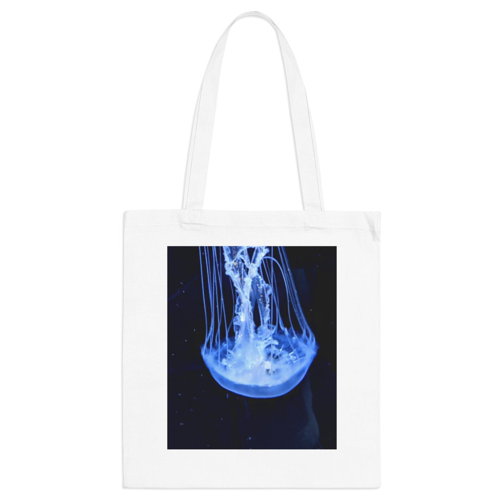 A colorful Jellyfish Tote Bag made of 100% cotton with long handles and cross-stitched detailing.