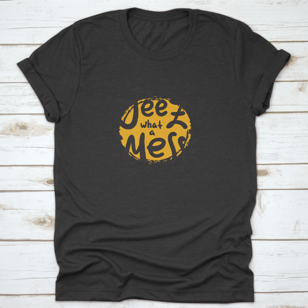 A comfortable t-shirt featuring the funny motivational quote 'Jeez What A Mess', made from high-quality cotton.