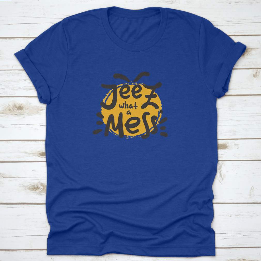 A comfortable t-shirt featuring the funny motivational quote 'Jeez What A Mess', made from high-quality cotton.