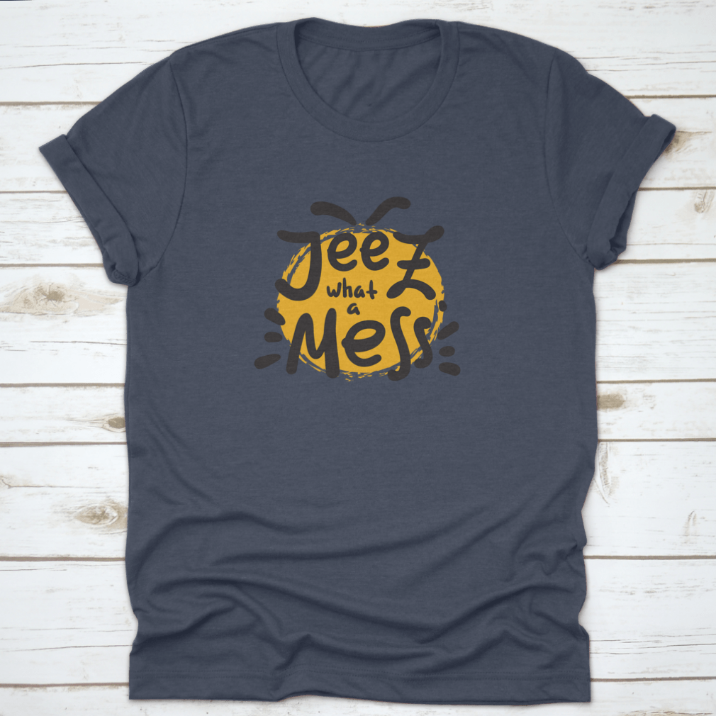 A comfortable t-shirt featuring the funny motivational quote 'Jeez What A Mess', made from high-quality cotton.