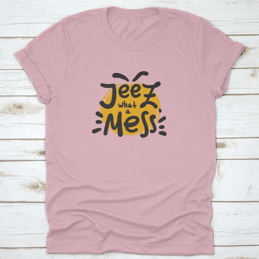 A comfortable t-shirt featuring the funny motivational quote 'Jeez What A Mess', made from high-quality cotton.