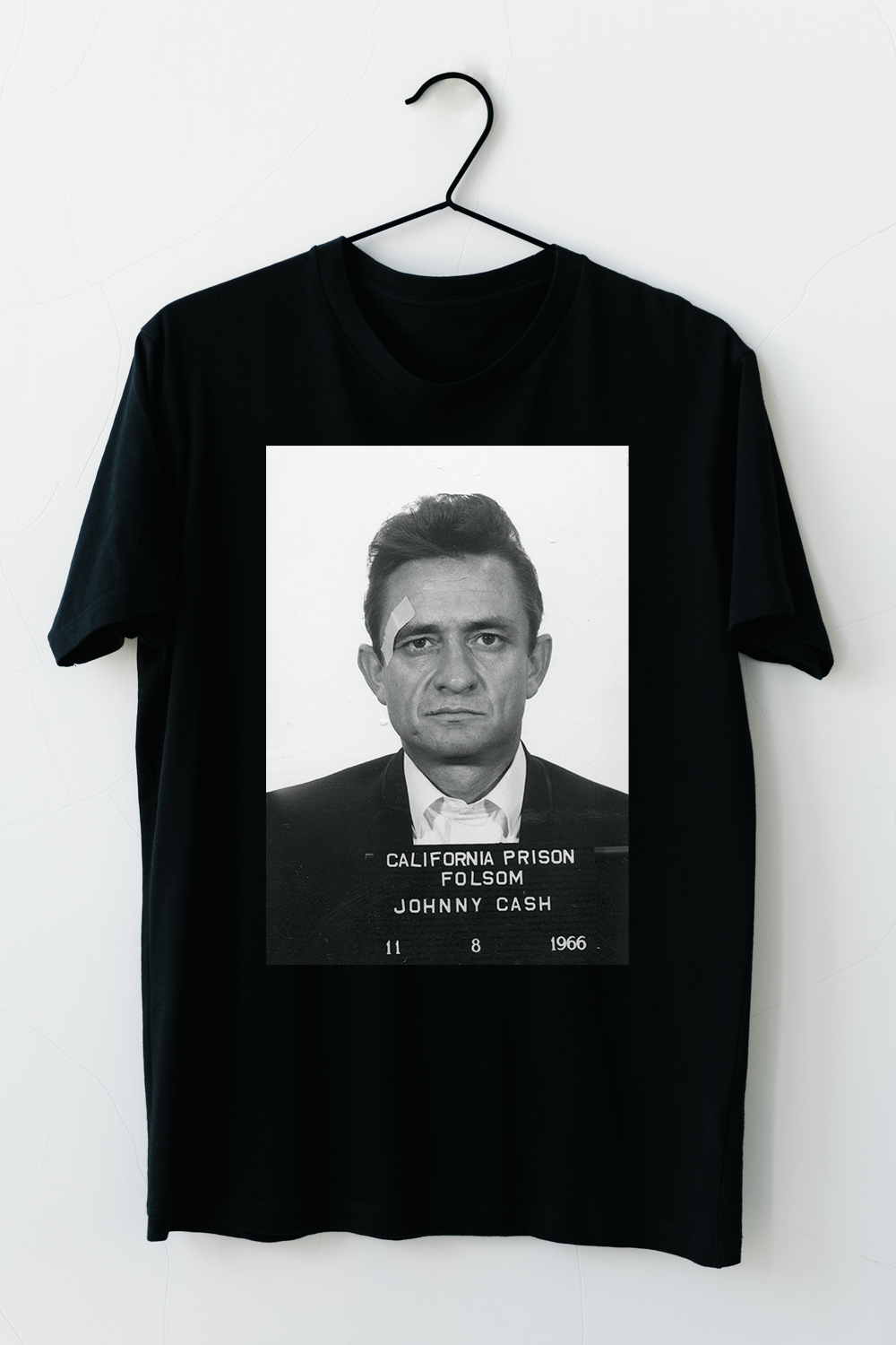 Johnny Cash Mugshot T-Shirt featuring a classic design with a vintage mugshot print, made from soft cotton fabric.