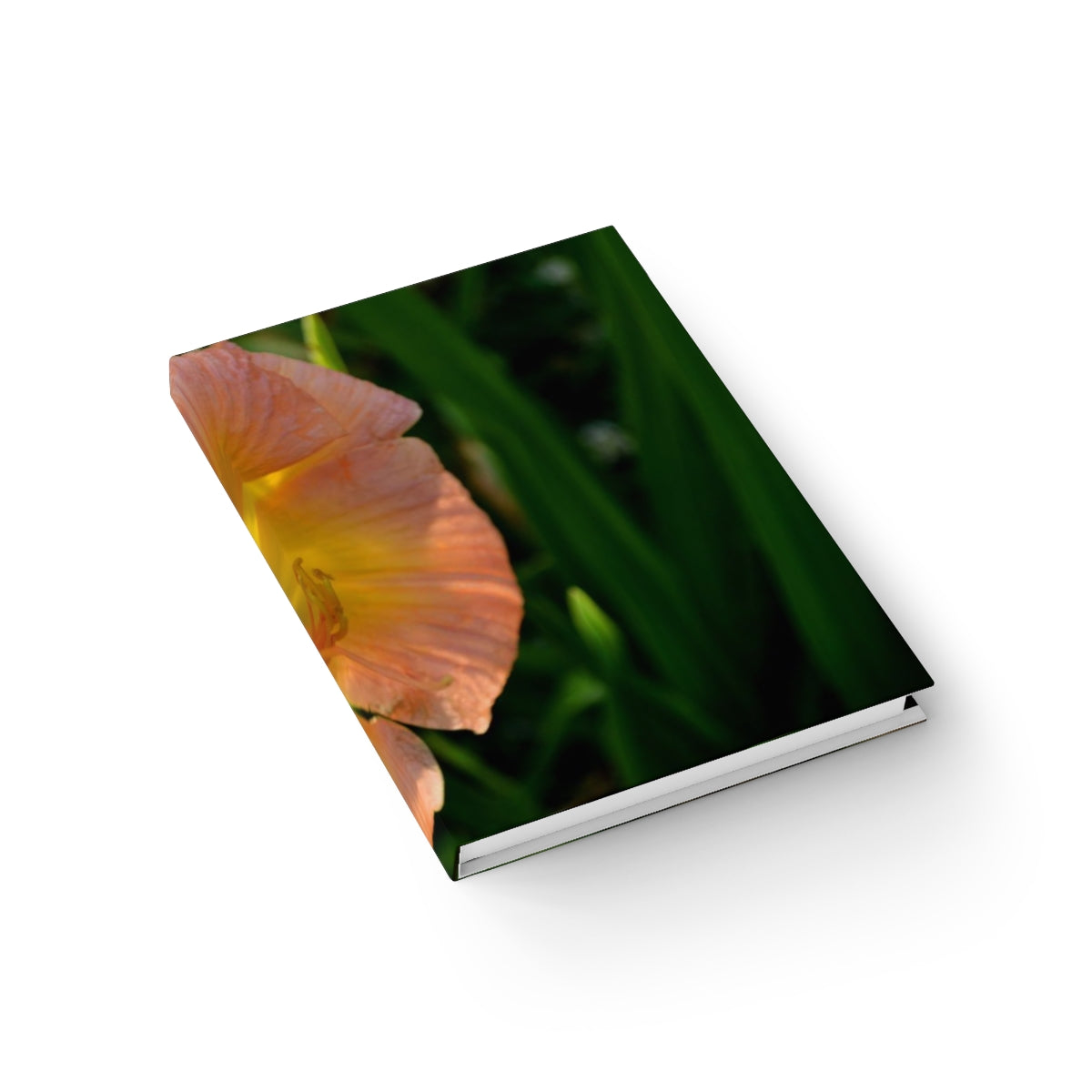 A hardcover blank journal with a vibrant wraparound print, showcasing its 128 blank pages for creativity.