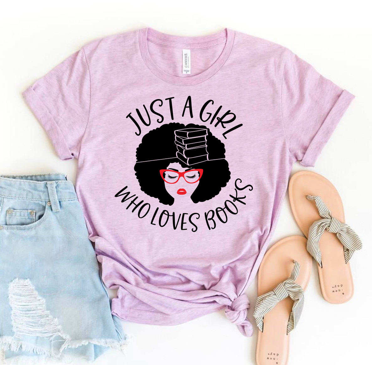 A stylish t-shirt featuring the phrase 'Just A Girl Who Loves Books', made from soft ring spun cotton, perfect for book lovers.