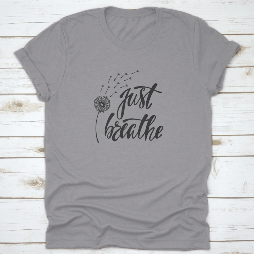 Just Breathe typography design on a soft cotton shirt, featuring an inspirational quote about freedom.