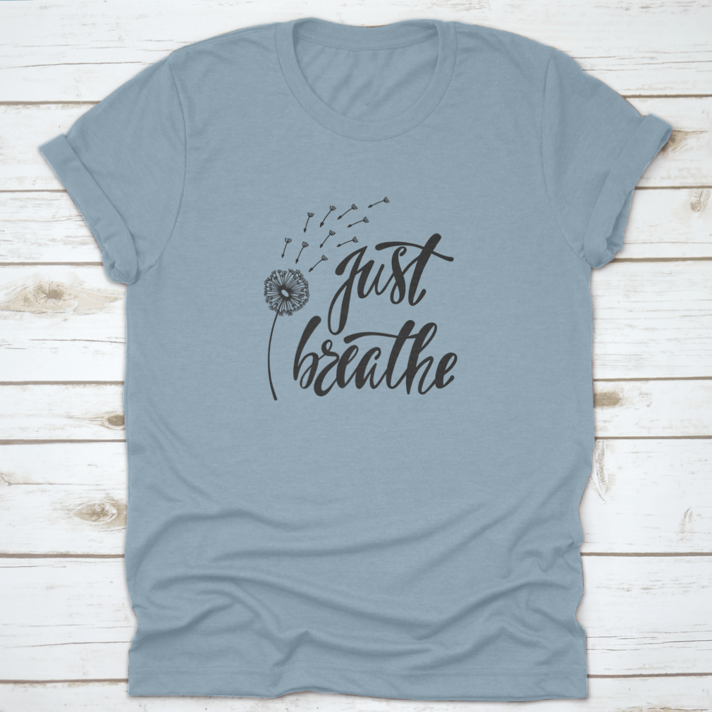 Just Breathe typography design on a soft cotton shirt, featuring an inspirational quote about freedom.