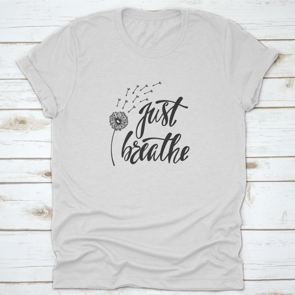 Just Breathe typography design on a soft cotton shirt, featuring an inspirational quote about freedom.