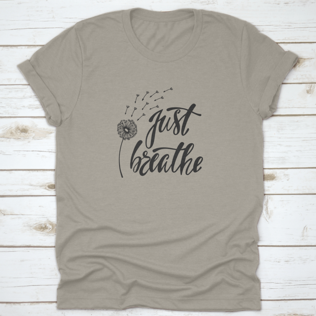 Just Breathe typography design on a soft cotton shirt, featuring an inspirational quote about freedom.