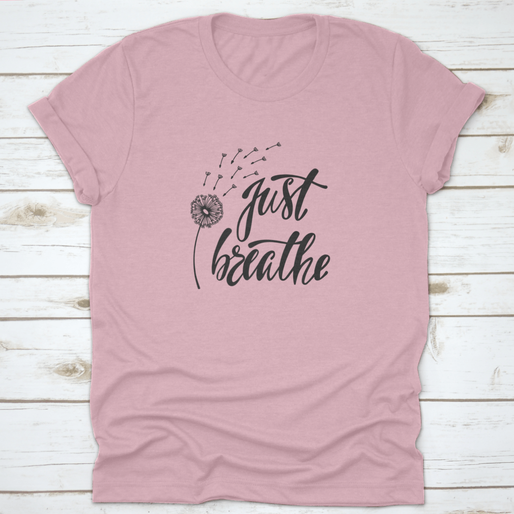 Just Breathe typography design on a soft cotton shirt, featuring an inspirational quote about freedom.