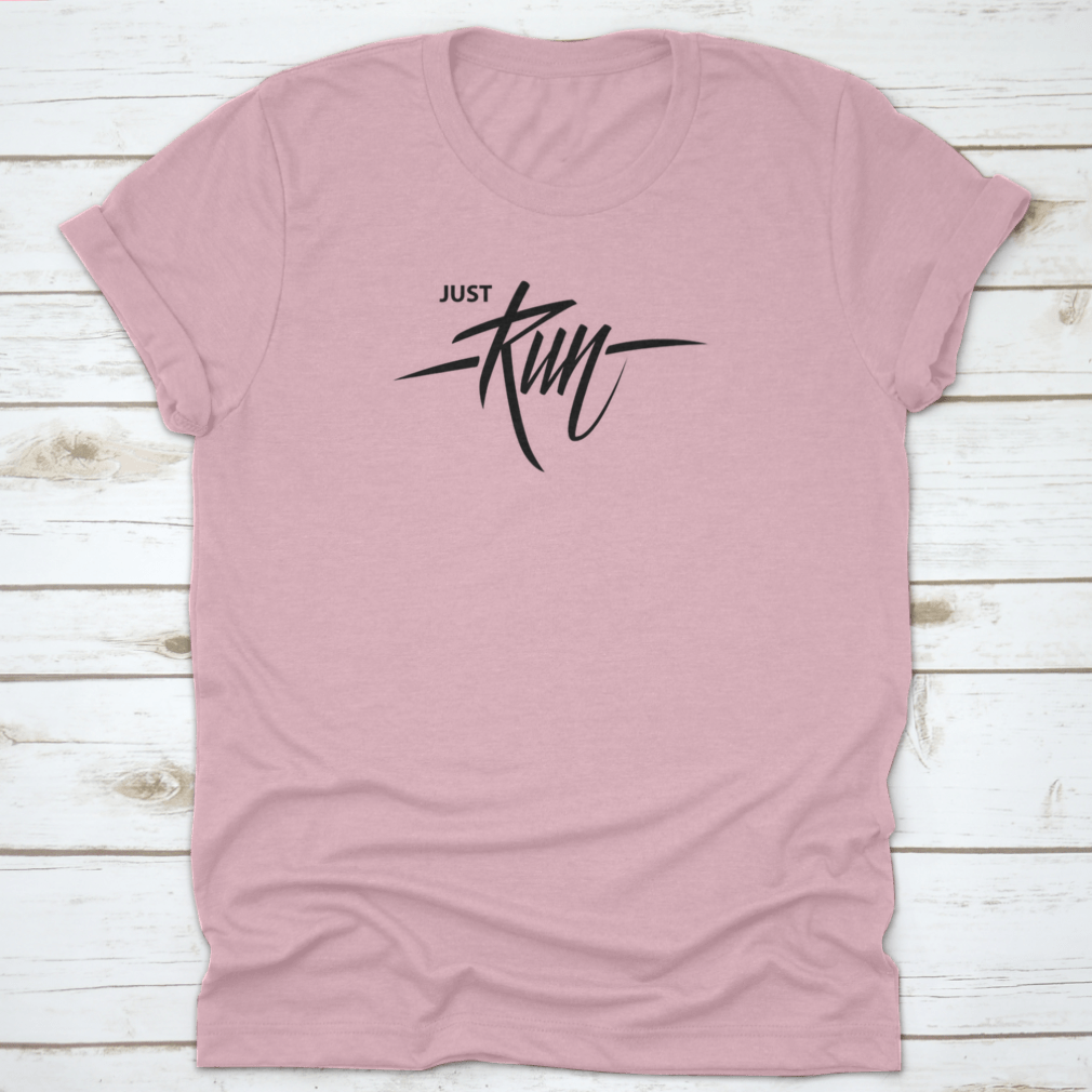 A comfortable cotton T-shirt featuring handwritten lettering that says 'Just Run', perfect for motivation and inspiration during workouts.