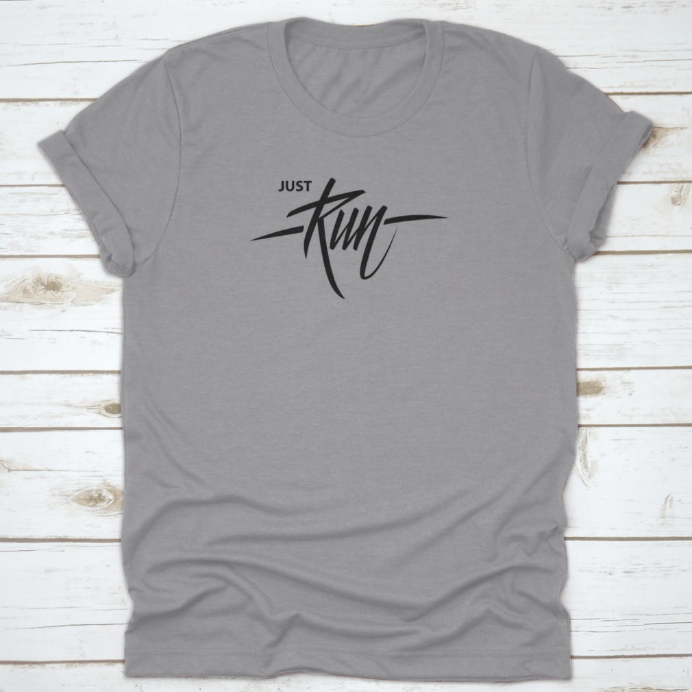 A comfortable cotton T-shirt featuring handwritten lettering that says 'Just Run', perfect for motivation and inspiration during workouts.