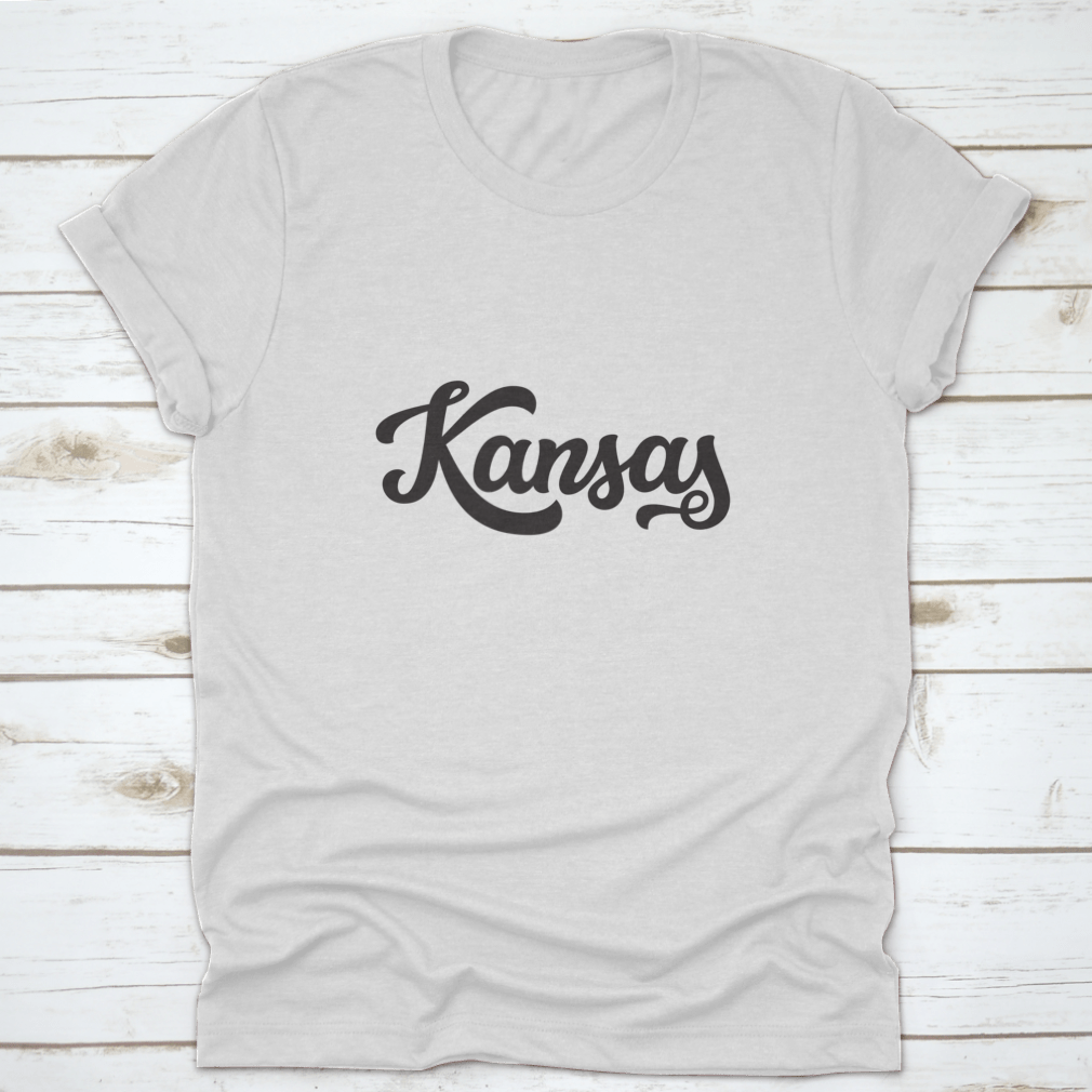 Kansas State modern calligraphy hand lettering apparel showcasing a stylish design on high-quality fabric.