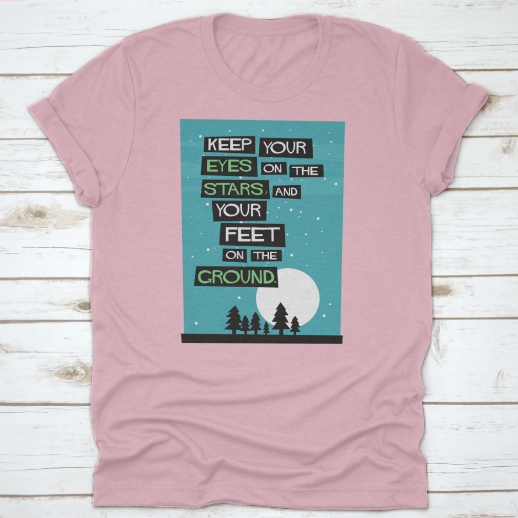 A classic cotton t-shirt featuring the phrase 'Keep Your Eyes On The Stars, And Your Feet On The Ground', displayed in a stylish manner.