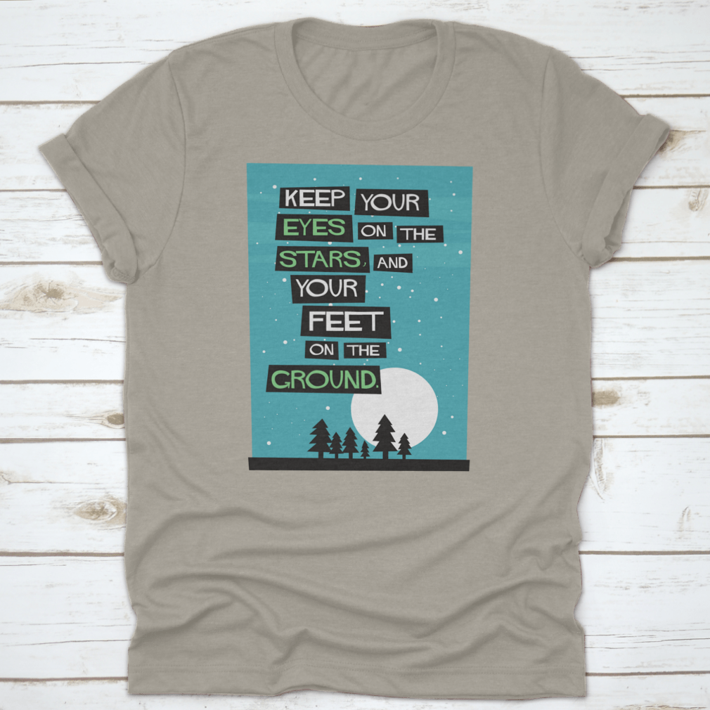 A classic cotton t-shirt featuring the phrase 'Keep Your Eyes On The Stars, And Your Feet On The Ground', displayed in a stylish manner.