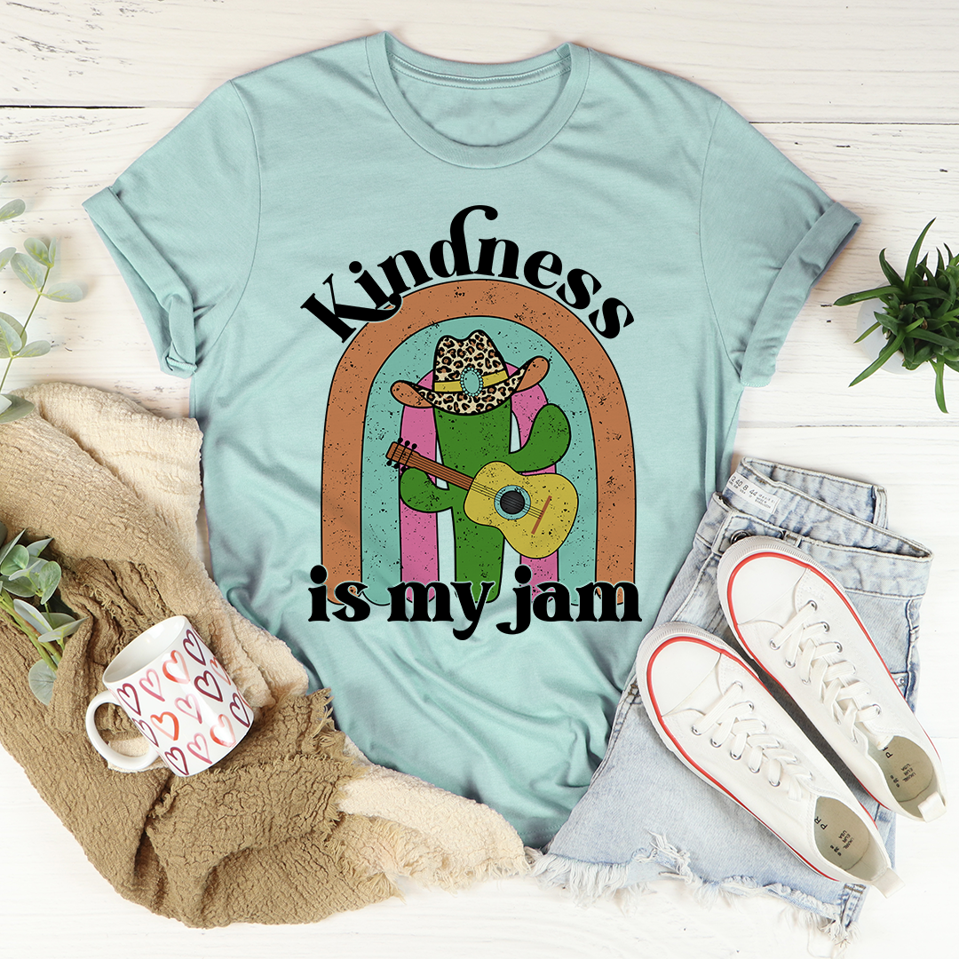 A soft, comfortable Kindness Is My Jam T-Shirt featuring a positive message, made from durable cotton with double stitching.