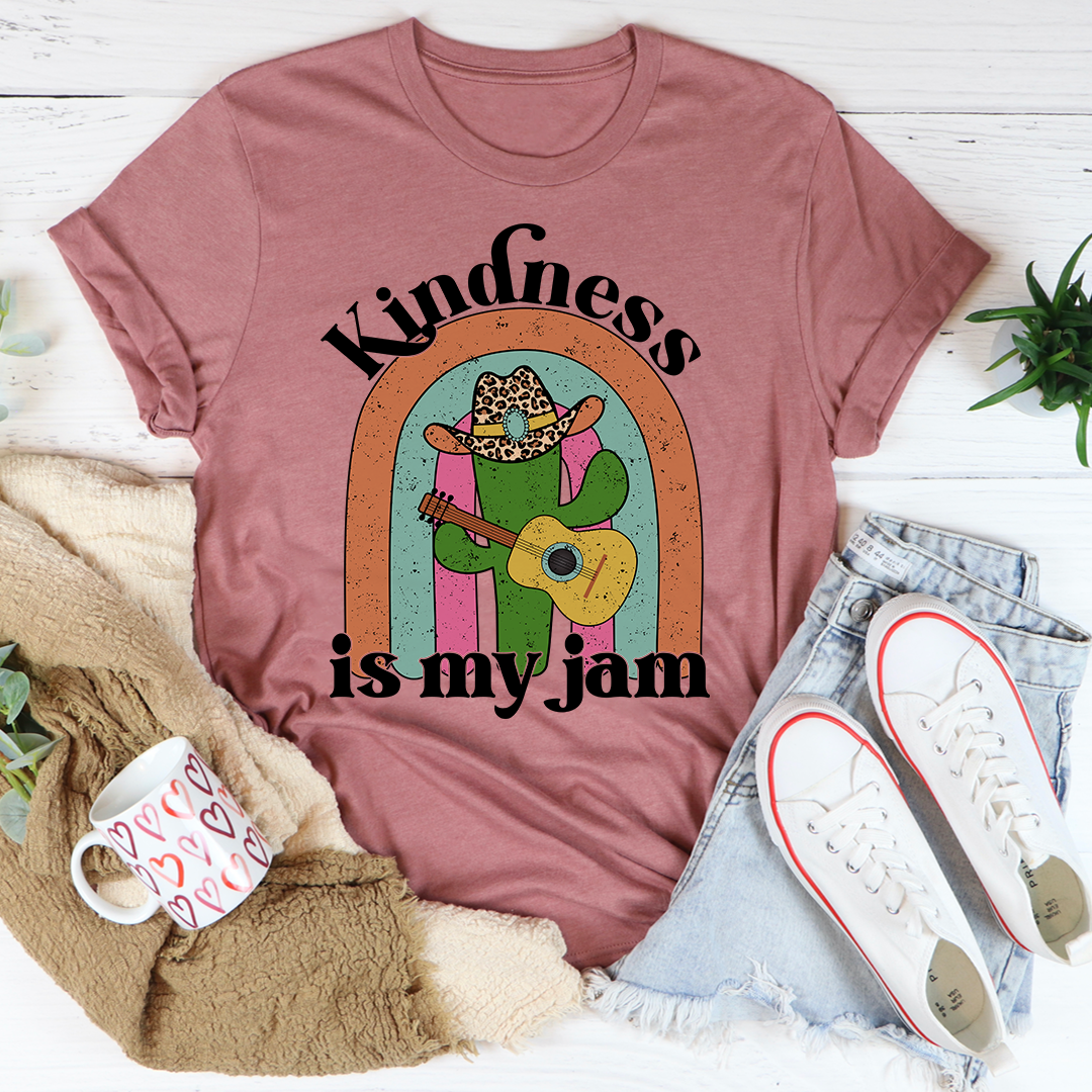 A soft, comfortable Kindness Is My Jam T-Shirt featuring a positive message, made from durable cotton with double stitching.