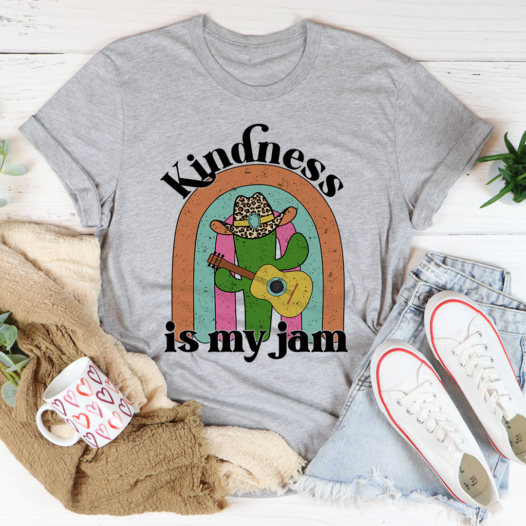 A soft, comfortable Kindness Is My Jam T-Shirt featuring a positive message, made from durable cotton with double stitching.