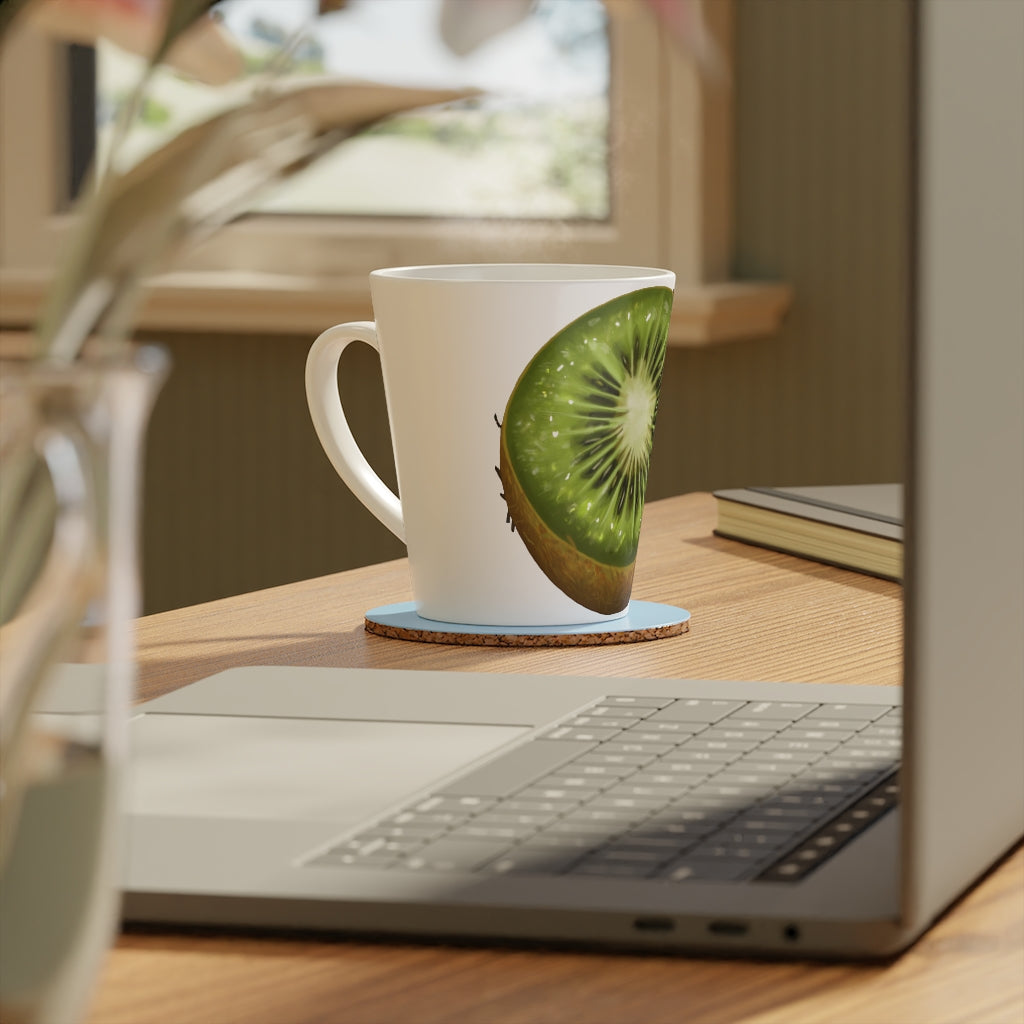 A stylish 12oz Kiwi Latte Mug made of durable white ceramic with a scratch-resistant finish and an easy-grip C-shaped handle.