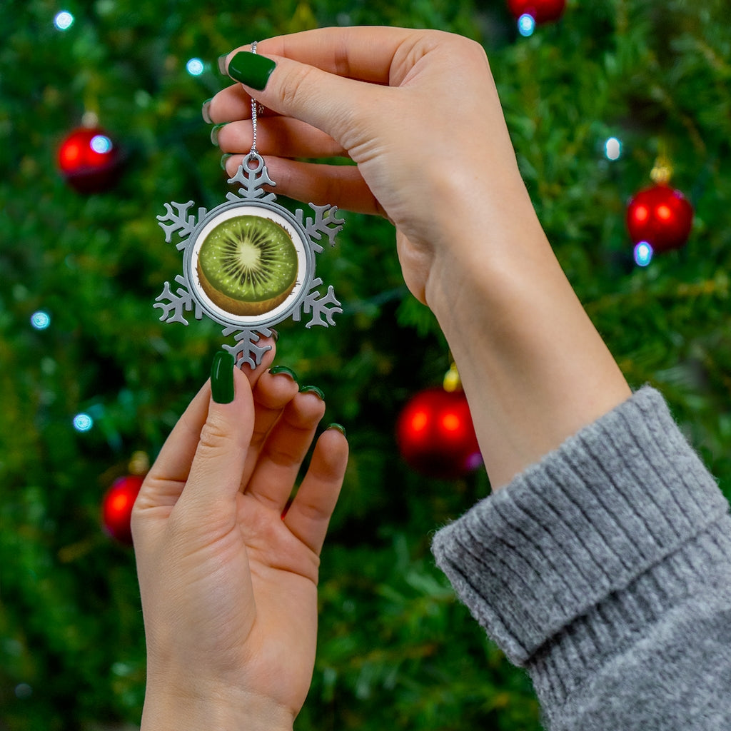 Kiwi Pewter Snowflake Ornament with silver-toned hanging string, showcasing intricate snowflake design.