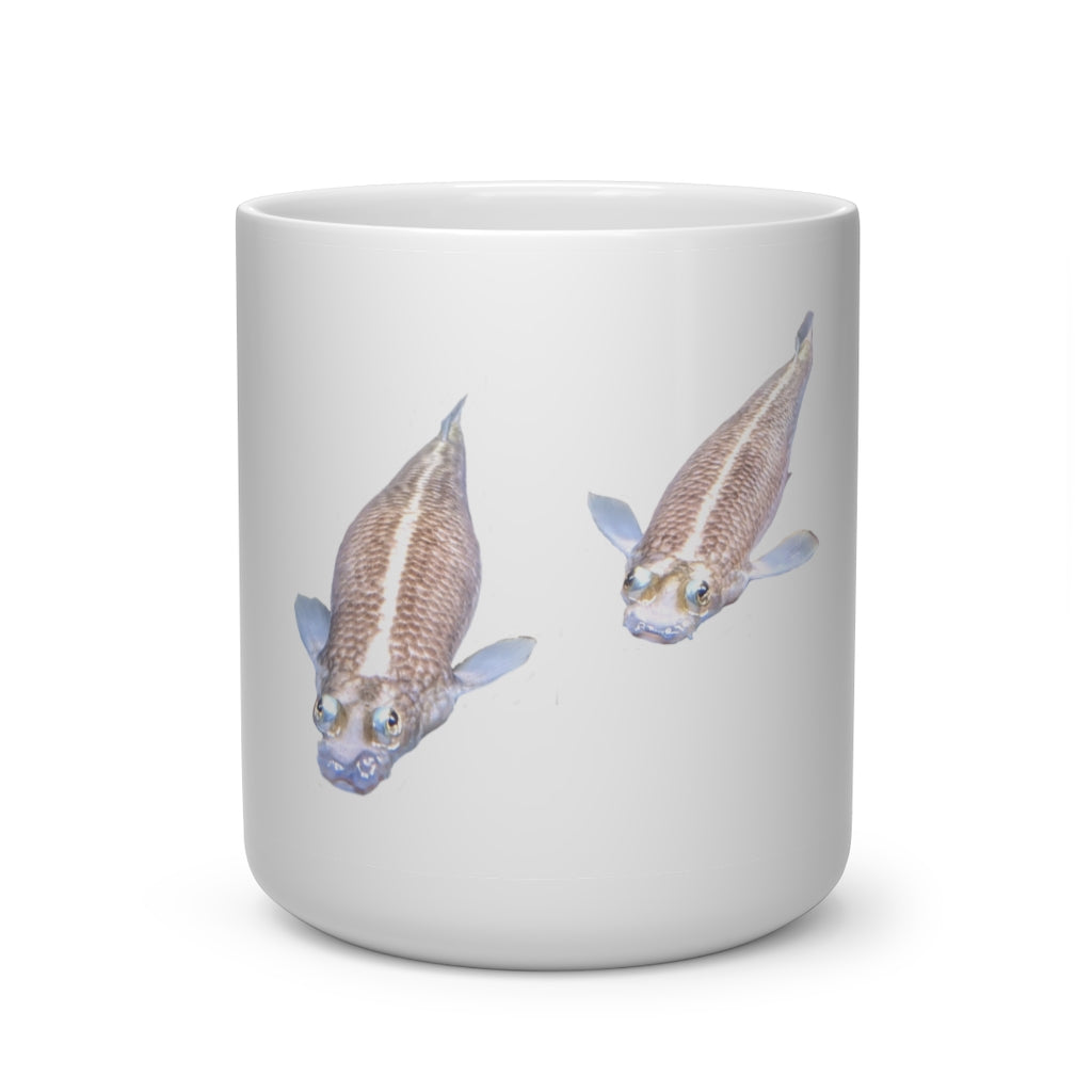 A white ceramic heart-shaped mug with a Koi fish design and a heart-shaped handle, perfect for hot beverages.