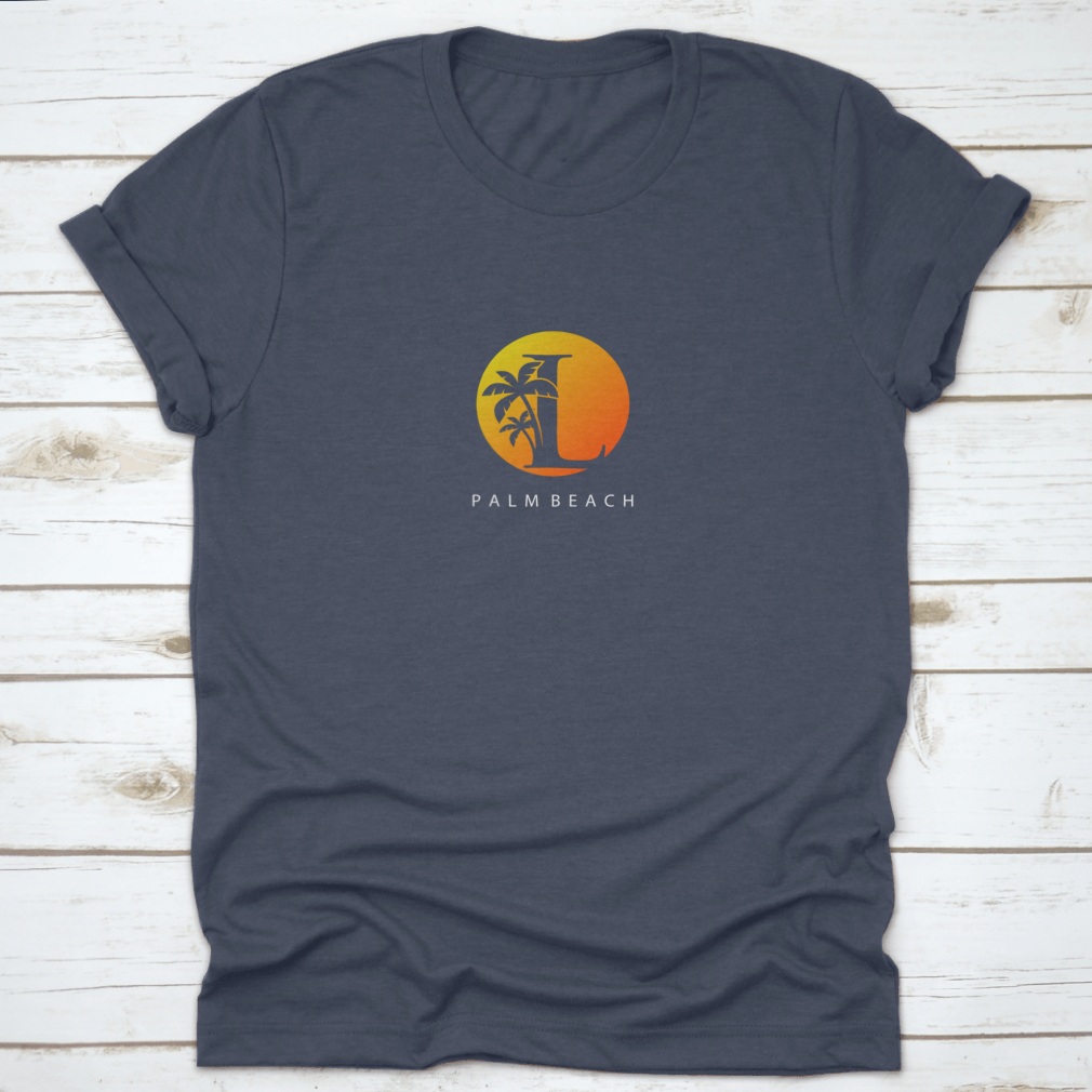 L Letter Palm Tree and Sun Set Logo Icon on a cotton shirt, showcasing a vibrant design perfect for surfing enthusiasts.