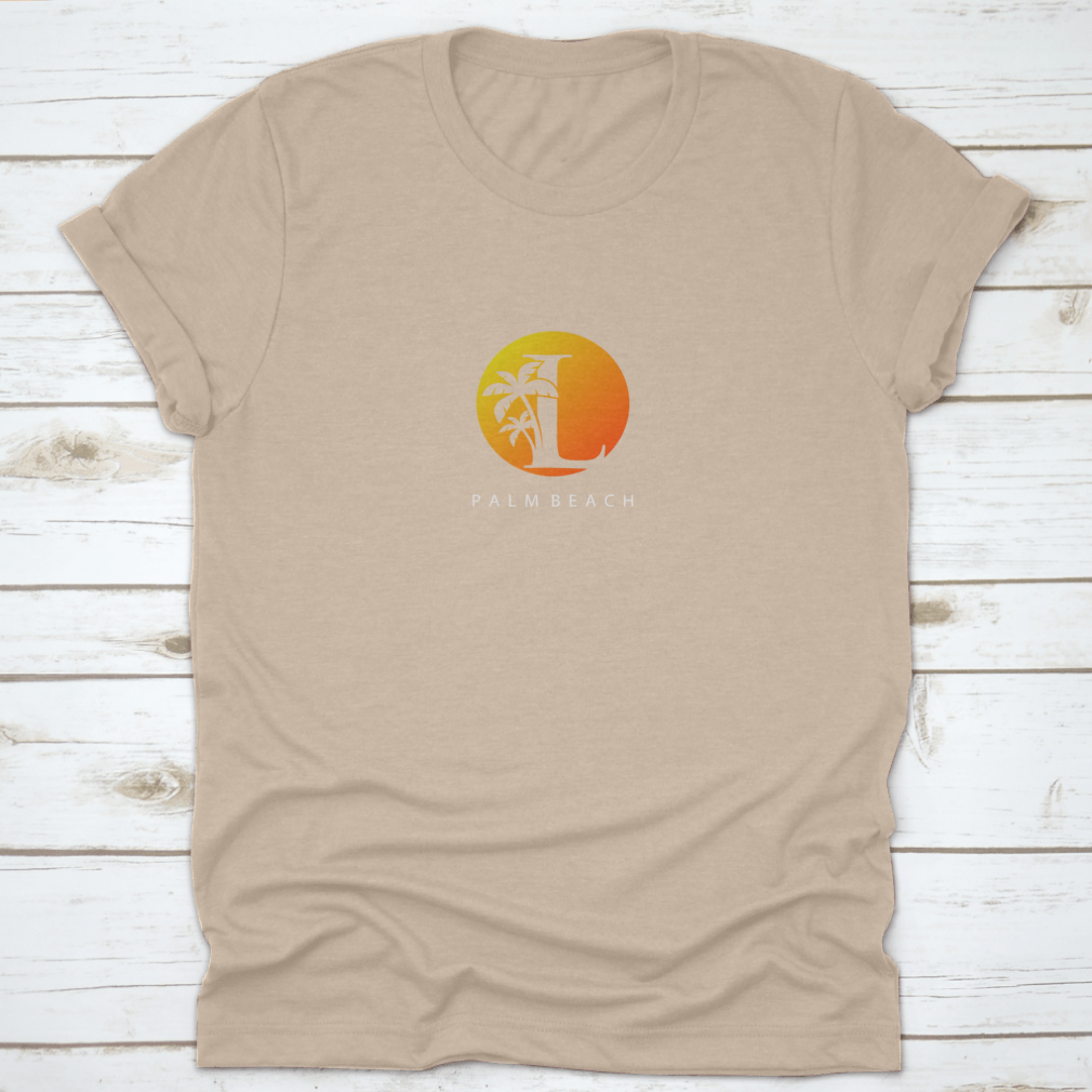 L Letter Palm Tree and Sun Set Logo Icon on a cotton shirt, showcasing a vibrant design perfect for surfing enthusiasts.