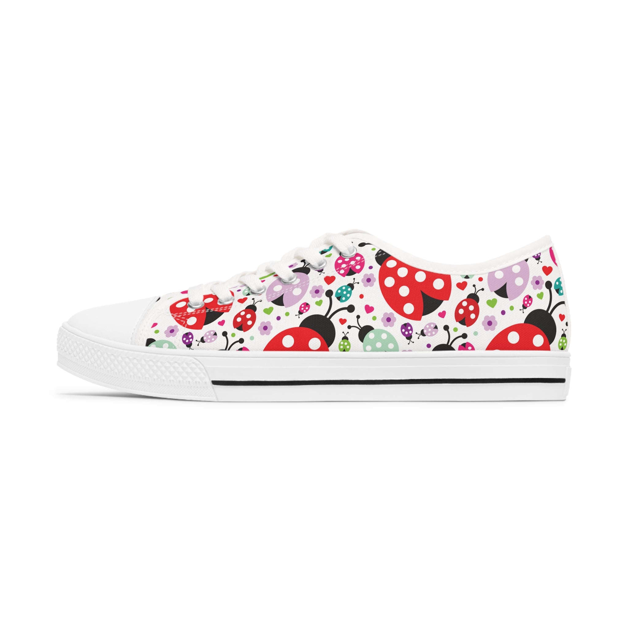 Lady Bug Women's Low Top Sneakers in black and white options, featuring breathable canvas and stylish silver metal eyelets.