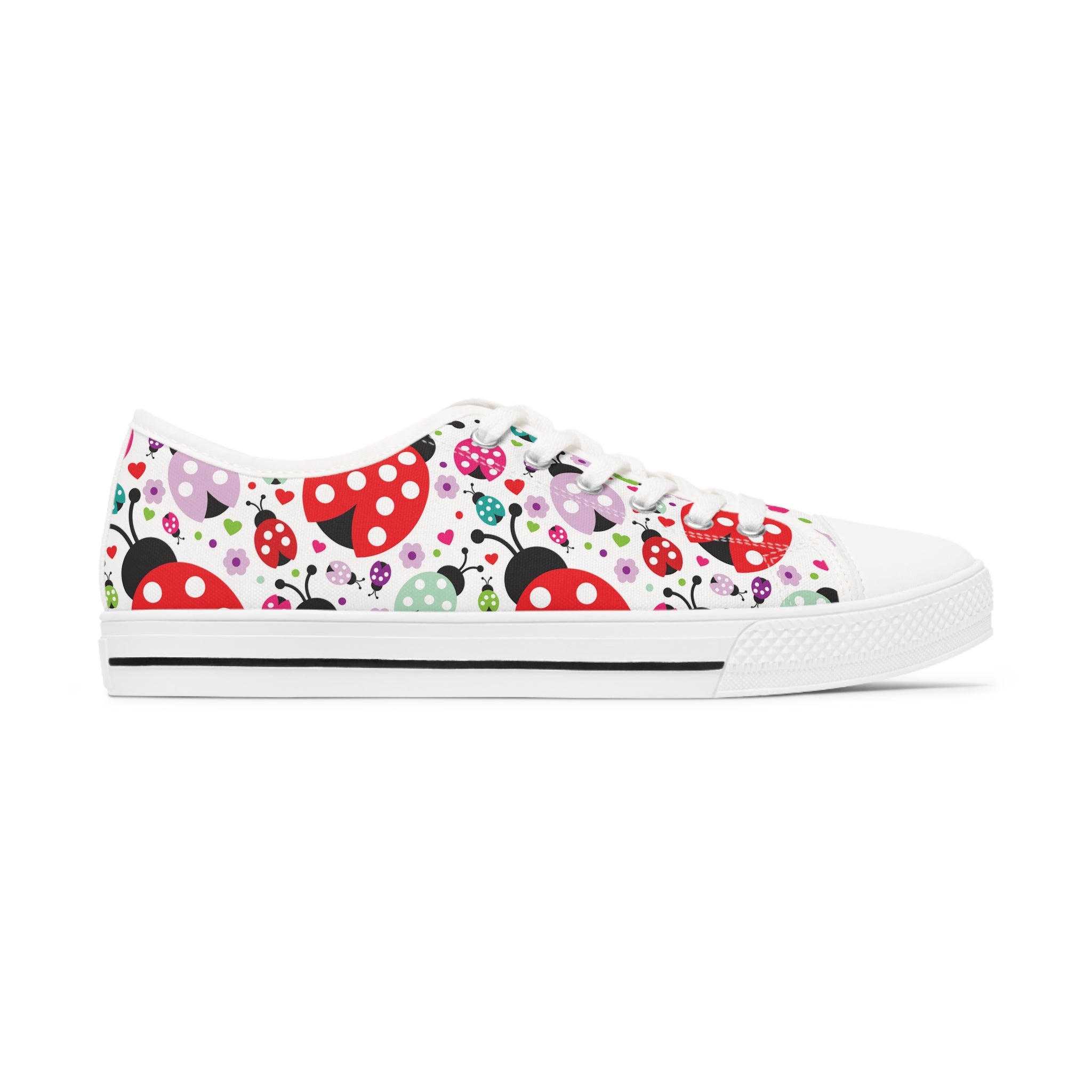 Lady Bug Women's Low Top Sneakers in black and white options, featuring breathable canvas and stylish silver metal eyelets.