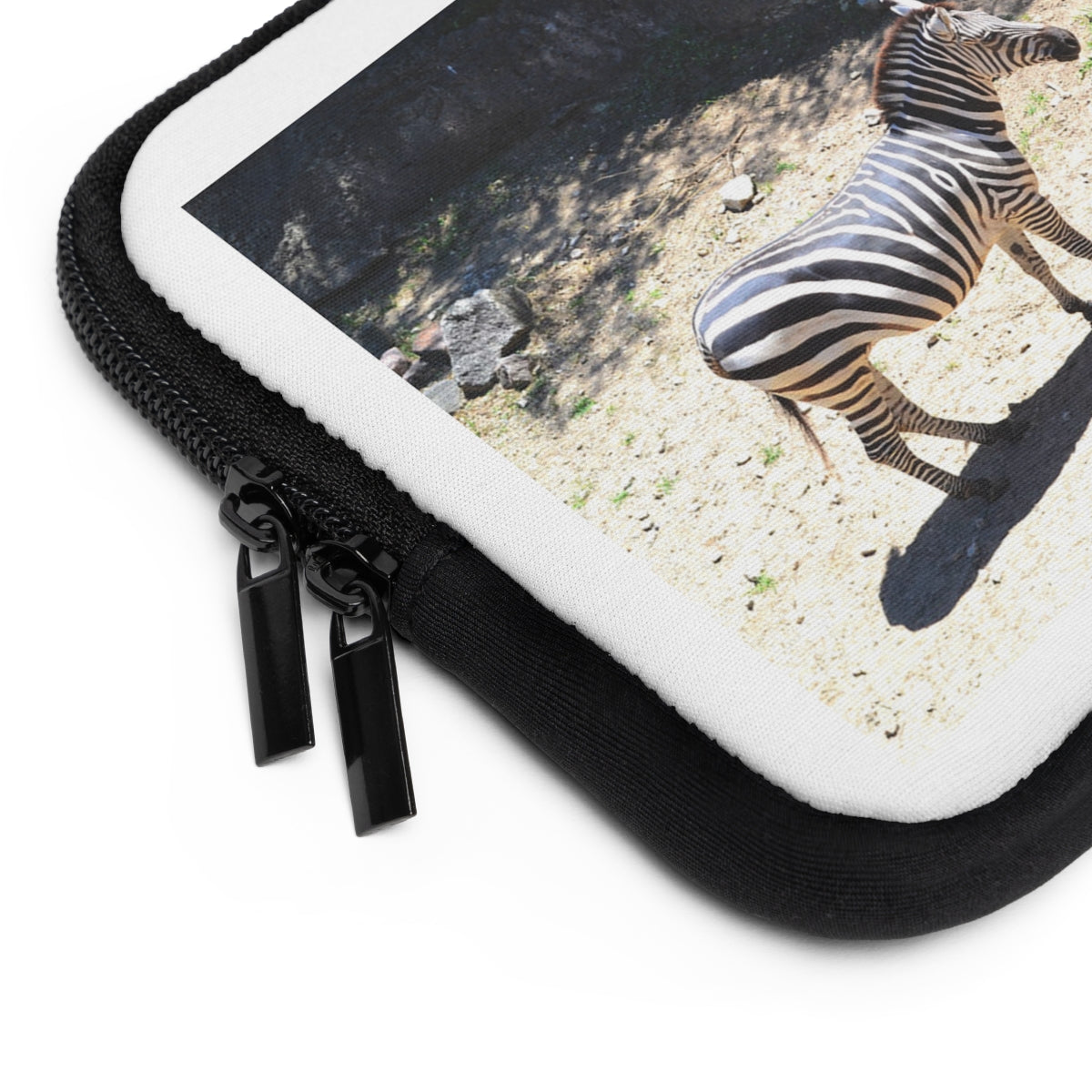 A stylish personalized laptop sleeve made of smooth neoprene, featuring a customizable front and solid black back, ideal for protecting laptops during travel.