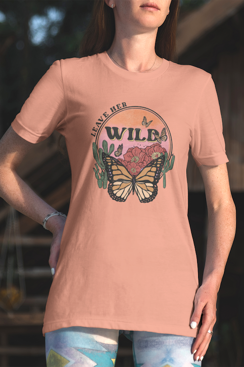 Leave Her Wild Vintage Tee in soft ring-spun cotton, featuring a stylish unisex design perfect for any occasion.