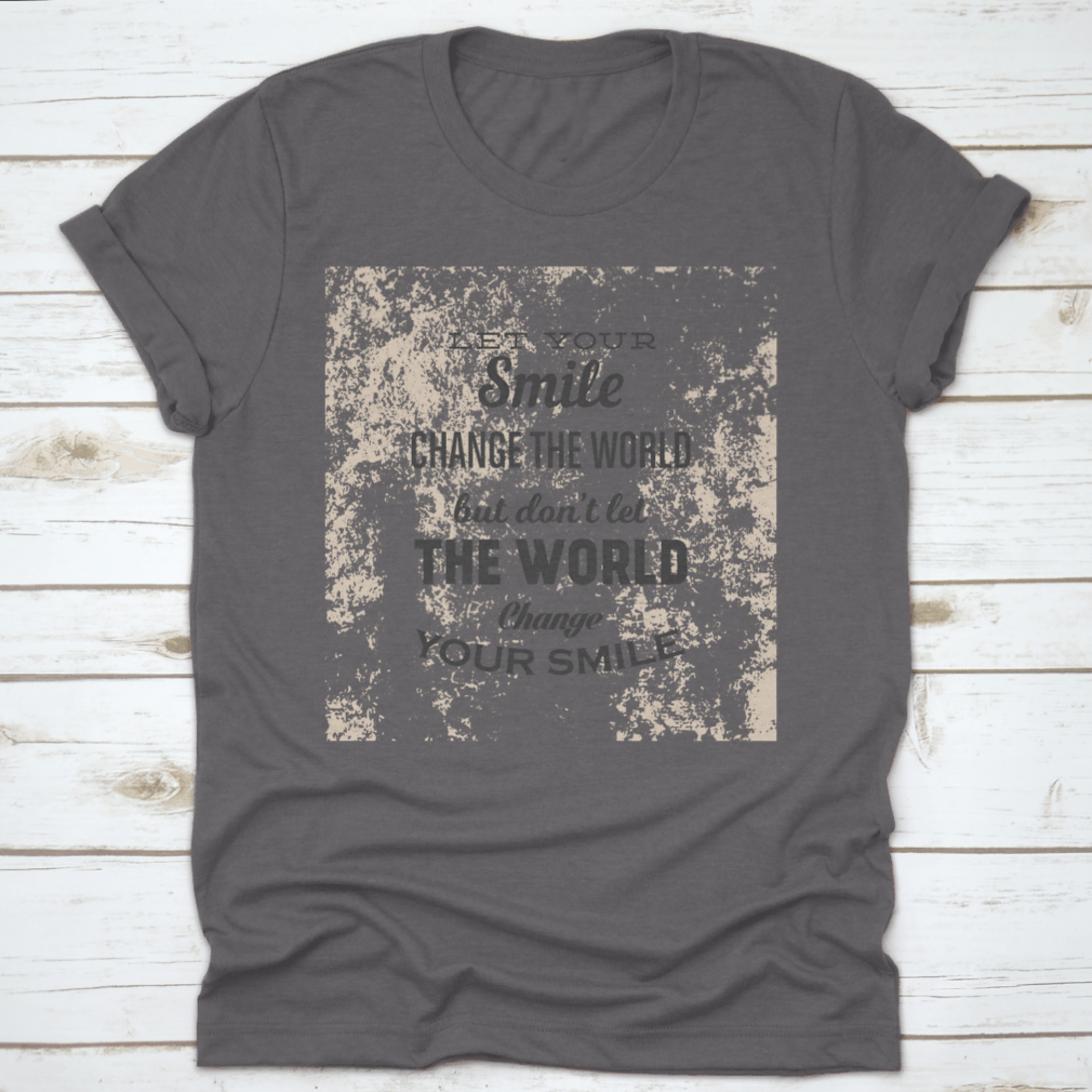 A stylish t-shirt featuring the phrase 'Let Your Smile Change The World' in a vibrant design, made from 100% cotton for comfort.