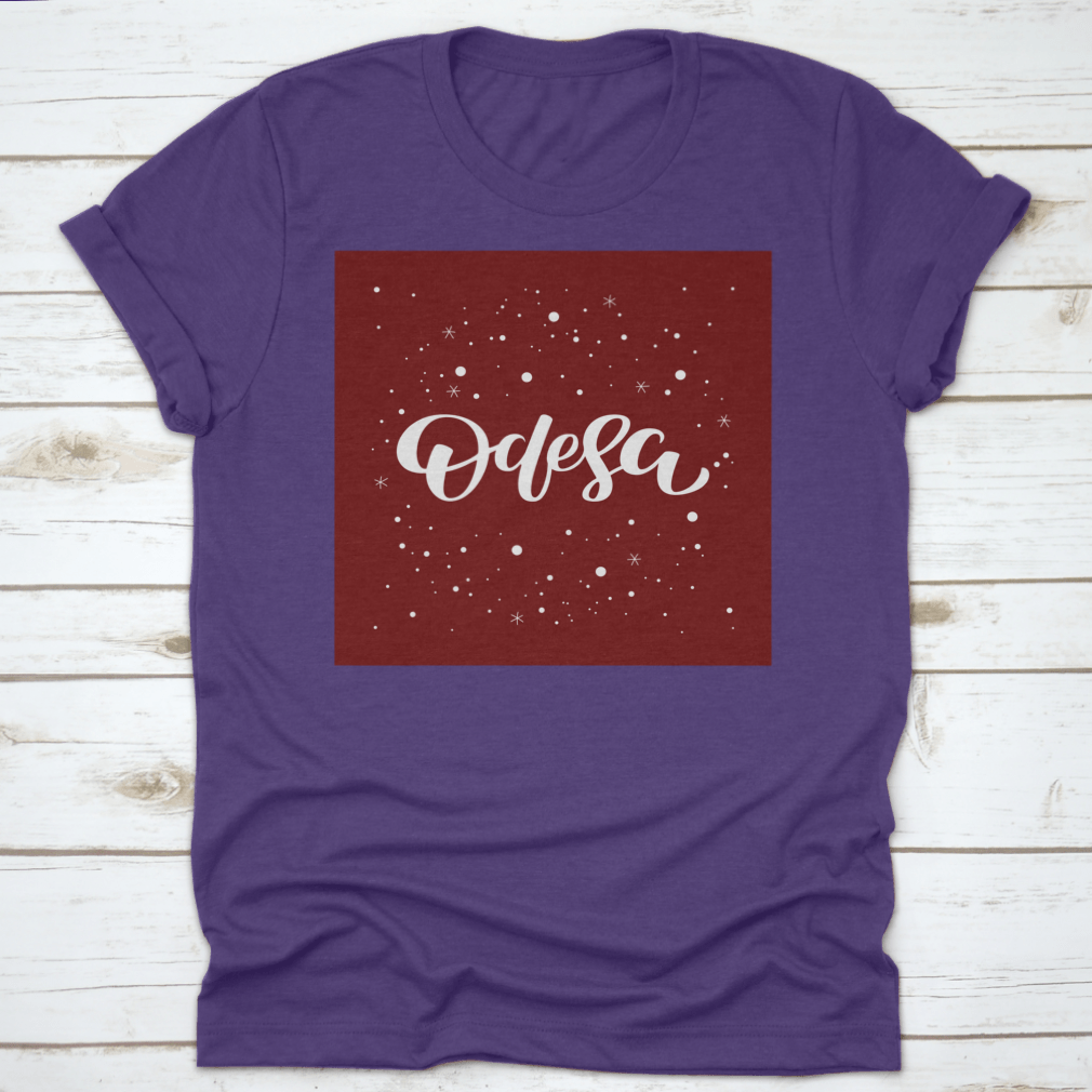 Odesa Lettering Text Design featuring a snowflake vector illustration on a comfortable cotton garment.