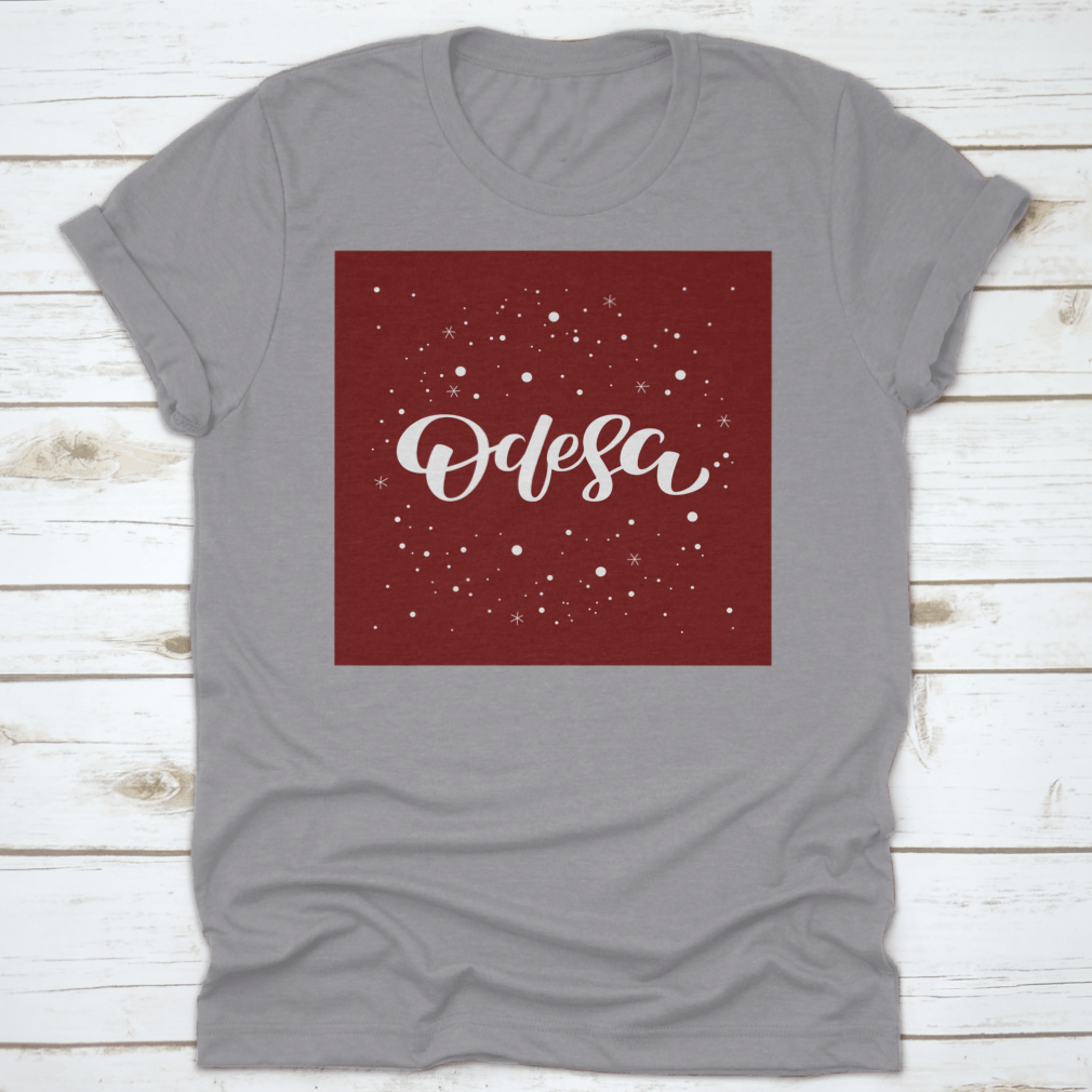 Odesa Lettering Text Design featuring a snowflake vector illustration on a comfortable cotton garment.