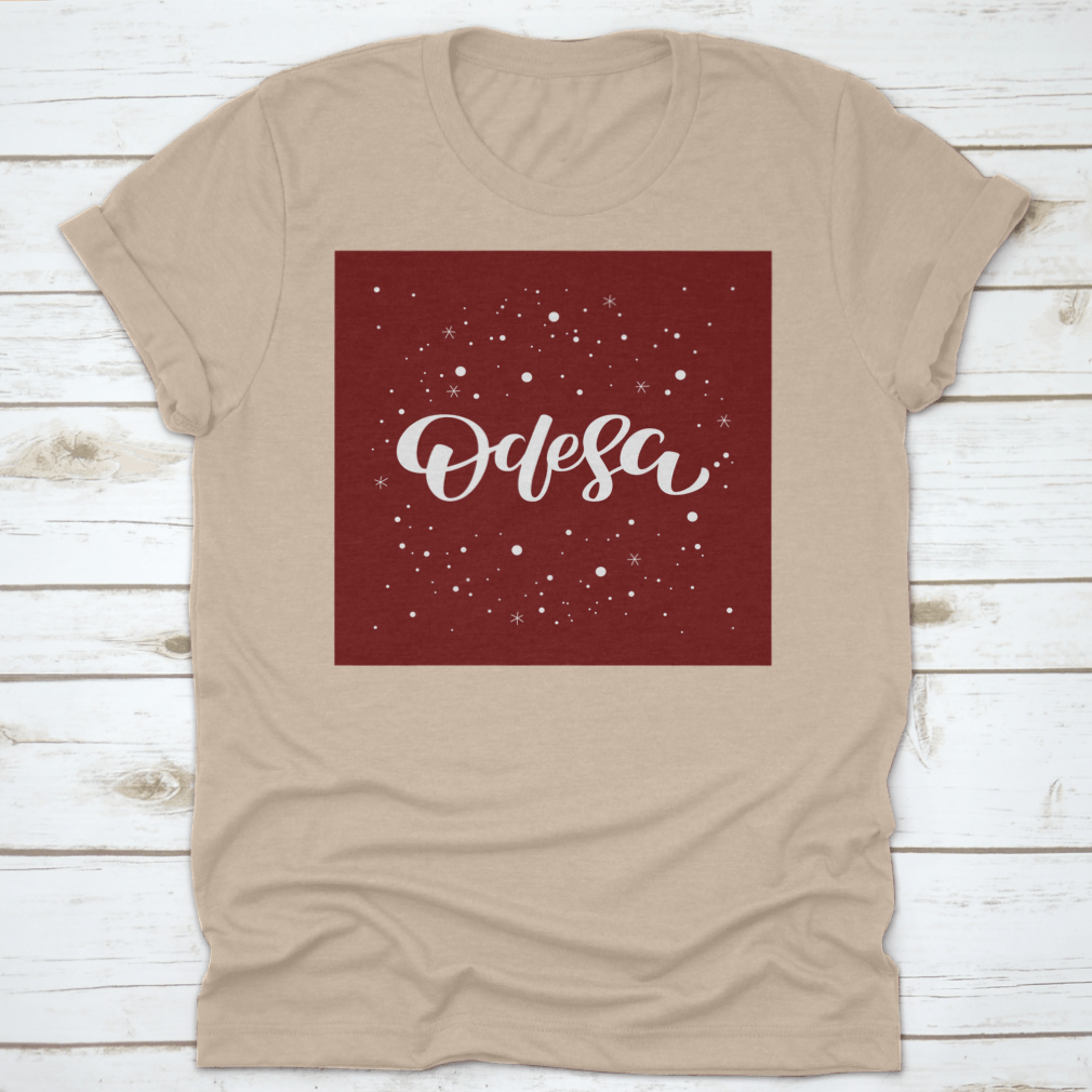 Odesa Lettering Text Design featuring a snowflake vector illustration on a comfortable cotton garment.