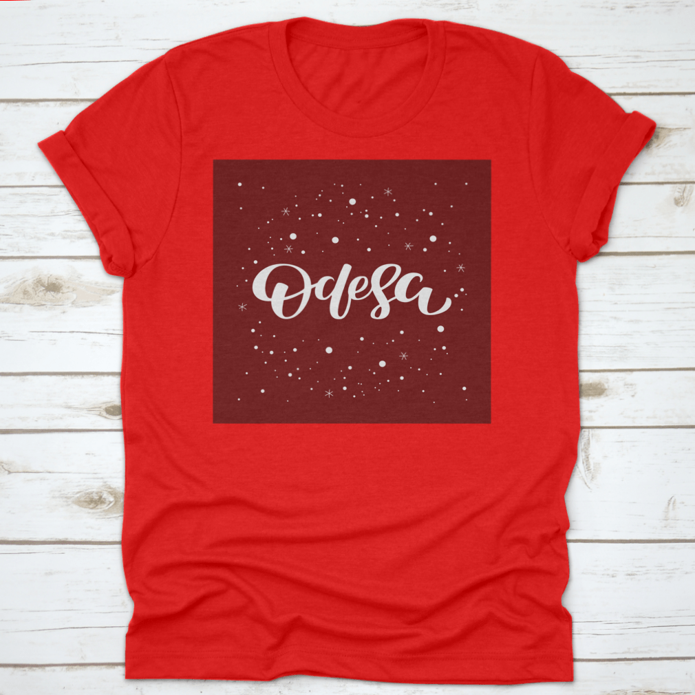 Odesa Lettering Text Design featuring a snowflake vector illustration on a comfortable cotton garment.